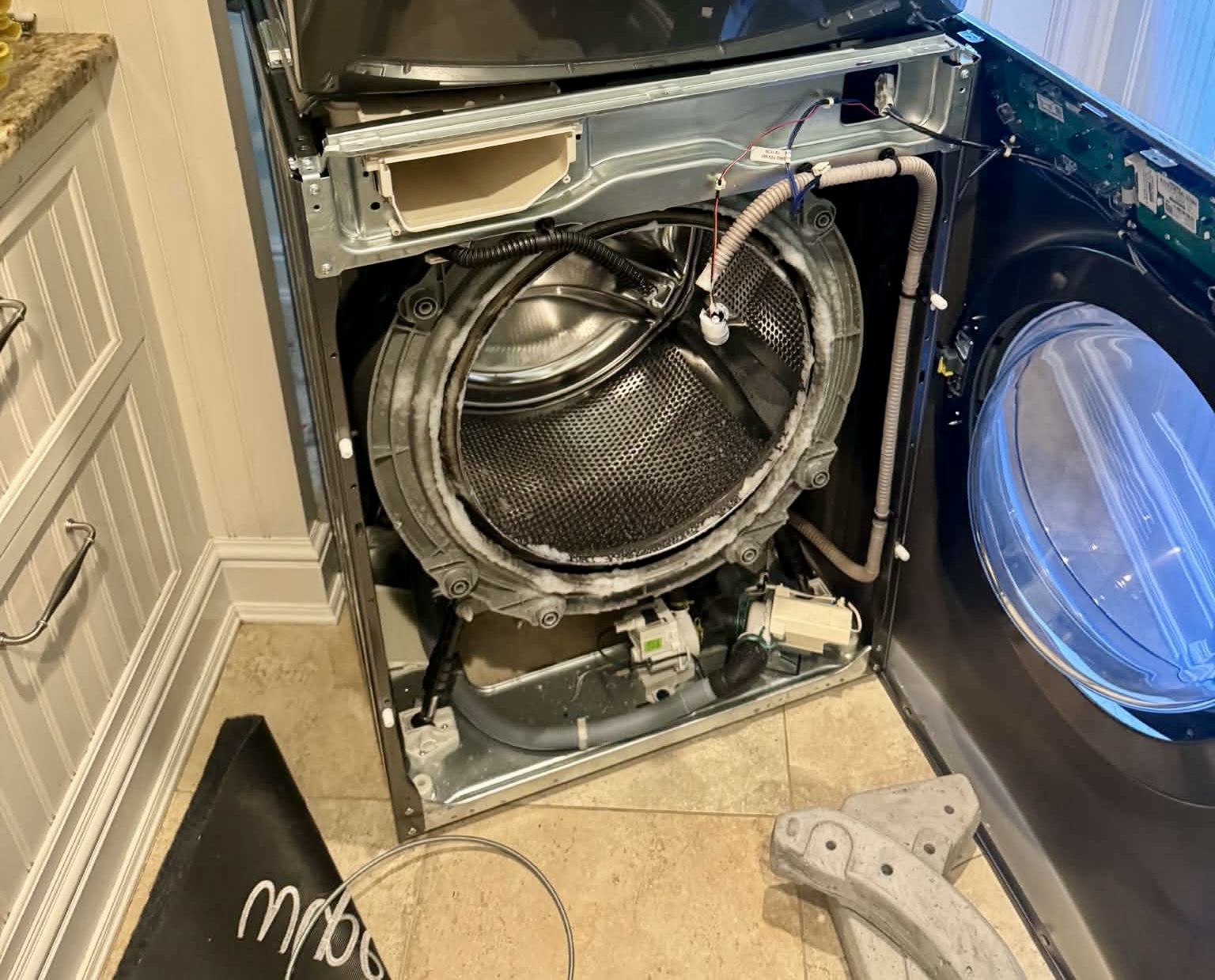Failed LG washer drain pump replaced after an OE error